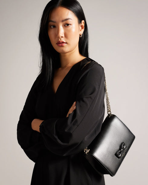 BAELEEN-Bags-It's all in the details: Cross body bag Top grain leather Bow detail Magnetic fastening Internal zip pocket Chain shoulder strap Logo detail Dimensions: 23cm x 15cm x 6cm- Ted Baker Romania